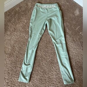 Gymshark leggings, V cut with pockets, in Seafoam color, size medium